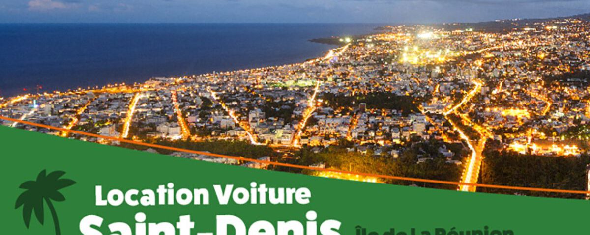 Photographie aérienne panoramique de Saint-Denis, capitale de La Réunion, montrant son centre-ville, ses quartiers et ses routes